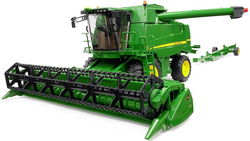 Image of John Deere Combine T670i with Header Trailer